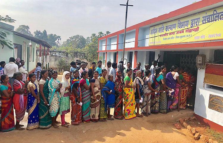 Voters line up at a polling station in Sukma in Chhattisgarh state on November 12, 2018. The state's newly elected state minister is setting up a committee to draft a journalist safety law. (AFP)