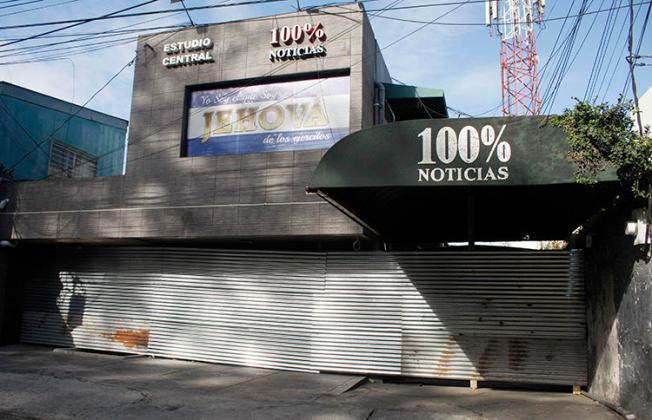 The 100% Noticias building is seen in Managua on December 22, 2018, one day after it was raided and closed by the Nicaraguan police. Two journalists from the broadcaster remain in detention. (Maynor Valenzuela/AFP)