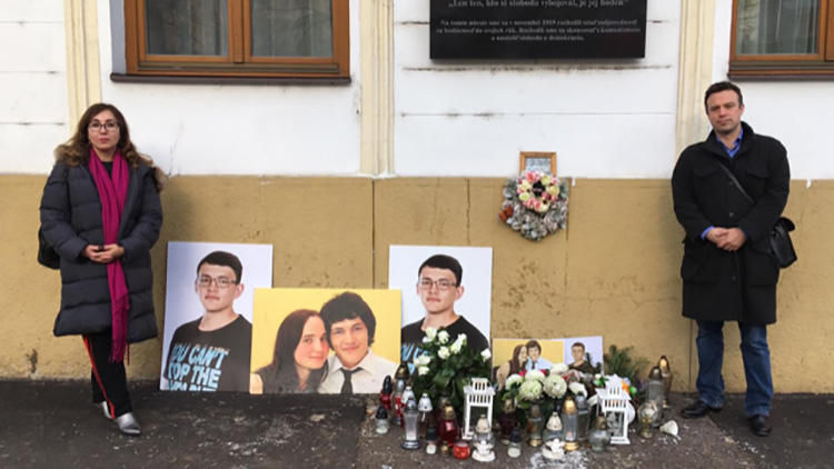 CPJ's Europe and Central Asia program coordinator Gulnoza Said, and EU representative Tom Gibson, pictured at a memorial for Slovak journalist Ján Kuciak and his fiancée Martina Kušnírová. (CPJ)