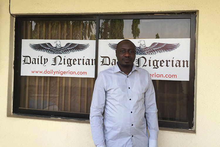 Jaafar Jaafar, of the Daily Nigerian, pictured outside the office of his newspaper in Abuja. (CPJ/Jonathan Rozen)