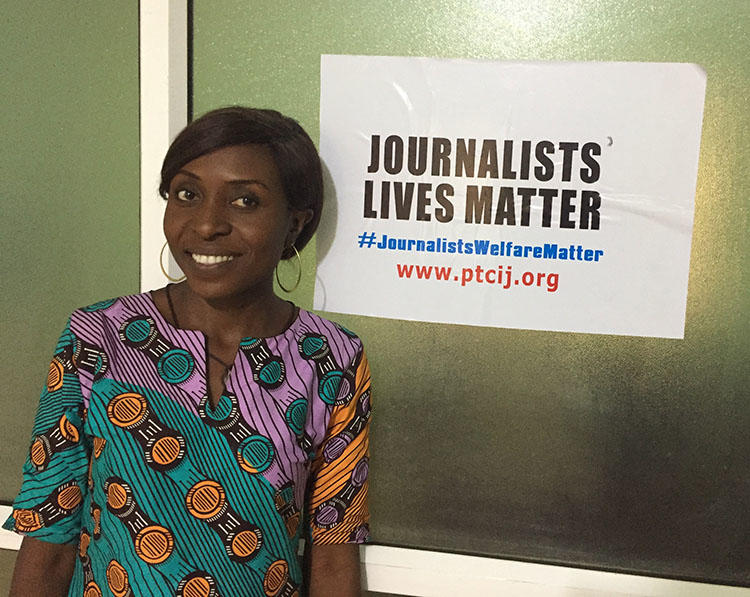 Evelyn Okakwu, a reporter for Premium Times, pictured at the Center for Investigative Journalism in Abuja. (CPJ/Jonathan Rozen)