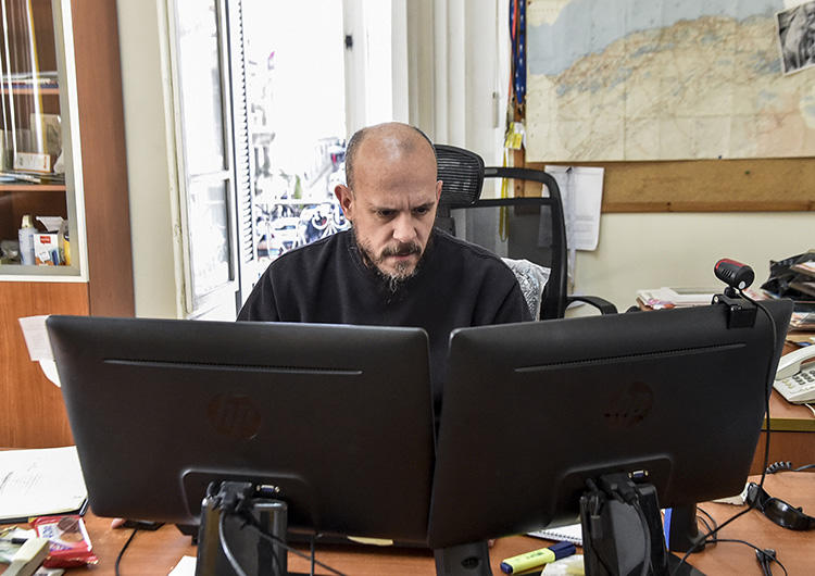 Aymeric Vincenot, AFP's Algiers bureau chief, sits at his office on March 1, 2019. Vincenot was recently expelled from Algiers after authorities declined to renew his press permit. (AFP)