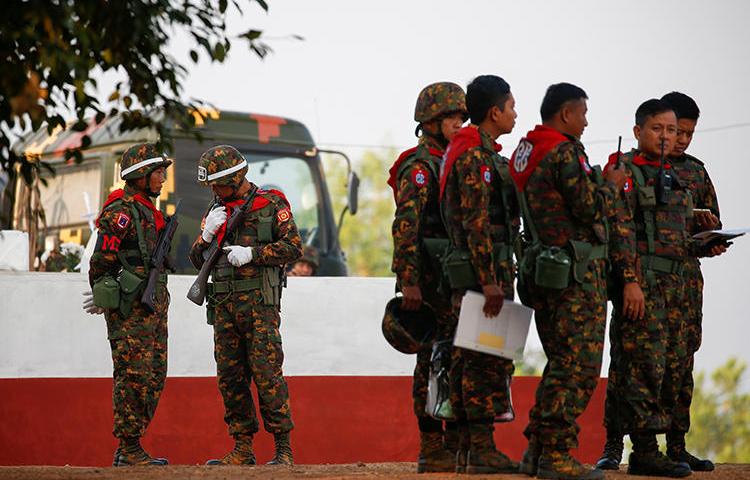 Soldiers are seen in the Ayeyarwaddy Delta region in Myanmar on February 2, 2018. The Myanmar military recently sued independent news outlet The Irrawaddy for defamation over its coverage. (Reuters/Lynn Bo Bo/Pool)