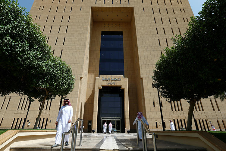 People are seen at the General Court in Riyadh, Saudi Arabia, on July 24, 2018. Jordanian journalist Abdulrahman Farhana was detained by Saudi authorities in February. (Reuters/Faisal Al Nasser)