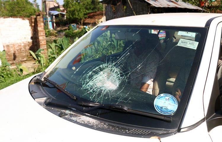 A damaged car that was holding Indian Express reporters is seen on May 6, 2019. Reporters from Indian Express and several other news organizations were injured while covering elections in West Bengal. (Image provided to CPJ by Shashi Ghosh/Indian Express)