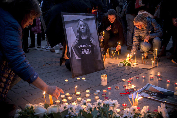 A vigil for TVN host Viktoria Marinova, in Sofia, in October 2018. Prosecutors ruled her murder was not related to her work, but the case highlighted the risks for Bulgaria's investigative journalists. (AFP/Nikolay Doychinov)
