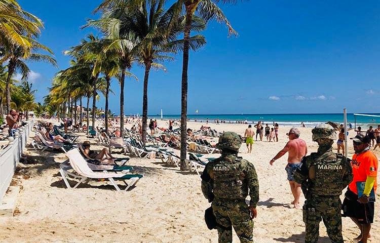 Mexican marines patrol the beach of Playacar, near the resort of Playa del Carmen, in Quintana Roo, in February 2019. Journalist Francisco Romero Díaz was shot dead in Playa del Carmen on May 16. (AFP/Daniel Slim)