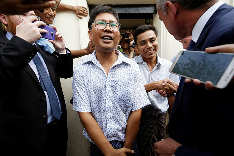 Reuters reporters Wa Lone and Kyaw Soe Oo are freed from prison in Yangon, Myanmar, on May 7 after receiving a presidential pardon. (Reuters/Ann Wang)
