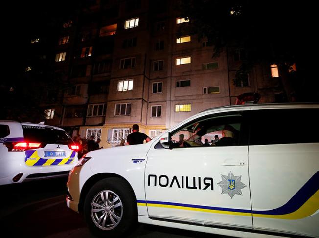 Police cars are seen in Kiev, Ukraine, on May 29, 2018. A journalist was recently attacked in Cherkasy and is now in a coma. (Reuters/Gleb Garanich)