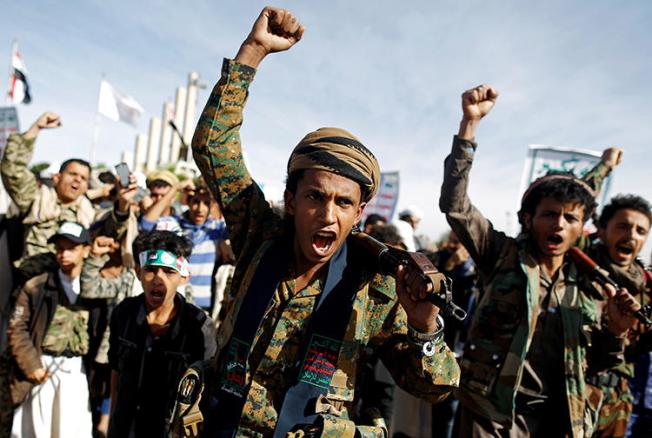 Supporters of the Houthi movement attend a rally to mark the fourth anniversary of the Saudi-led military intervention in Yemen's war, in Sanaa, Yemen, on March 26, 2019. The Houthis are currently detaining at least 10 journalists in harsh conditions. (Reuters/Khaled Abdullah)