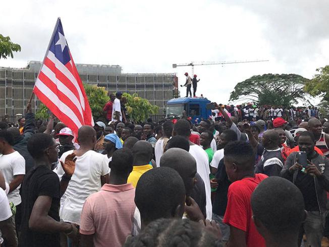 Demonstrators are seen in Monrovia, Liberia, on June 7, 2019. Amid the protests, social media services were disrupted throughout Liberia. (AFP/Carielle Doe)