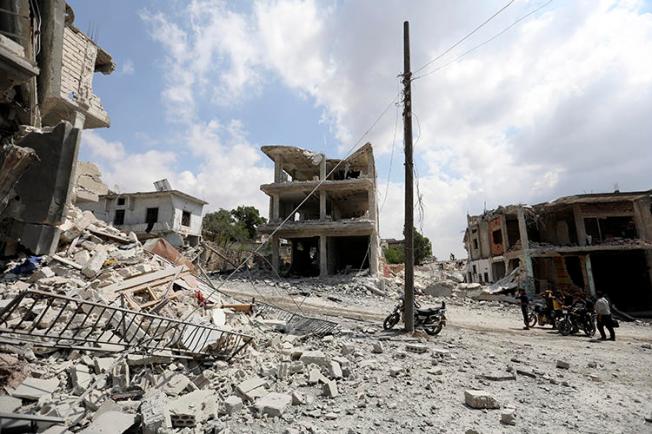 A damaged building is seen in Idlib, Syria, on June 14, 2019. Photojournalist Amjad Hassan Bakir was recently killed in an airstrike in Idlib. (AFP/Omar Haj Kadour)