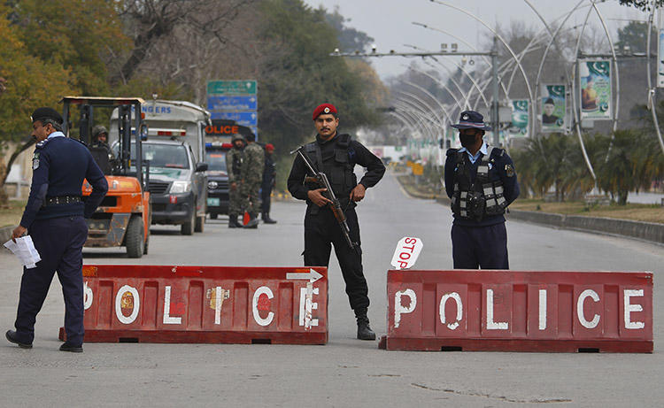 Pakistani police officers are seen in Islamabad on February 17, 2019. Journalist Muhammad Bilal Khan was recently stabbed to death in Islamabad. (AP/Anjum Naveed)