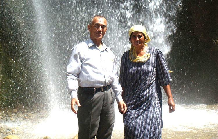 Kyrgyzstan journalist Azimjon Askarov and his wife, Khadicha, pictured during a family vacation in Arslanbob in the summer of 2009. 'This was Azimjon's last summer of freedom,' Khadicha told CPJ. (Askarov family)