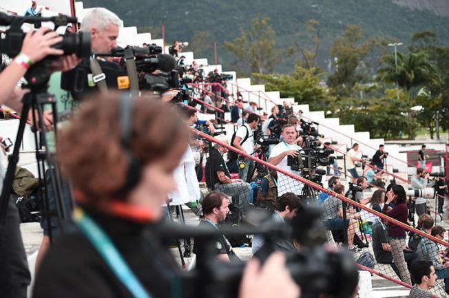 Journalists photograph the Netherlands soccer team as it trains in Brazil in June 2014. A survey by the Dutch Association of Journalists found female journalists are harassed and threatened over their work. (AFP/Damien Meyer)