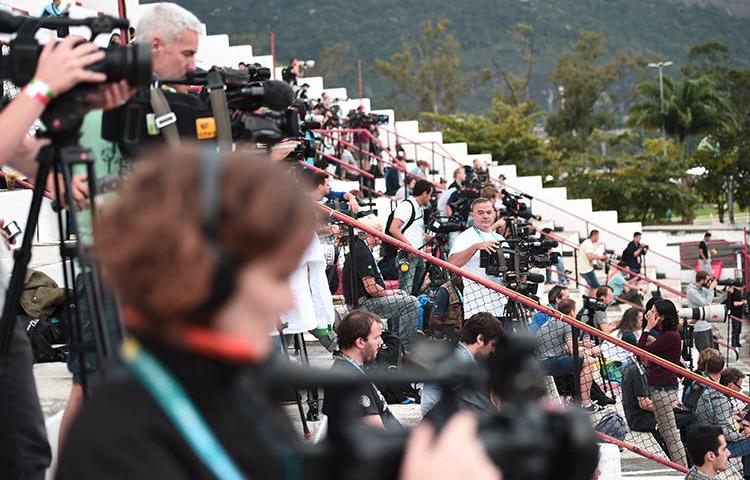 Journalists photograph the Netherlands soccer team as it trains in Brazil in June 2014. A survey by the Dutch Association of Journalists found female journalists are harassed and threatened over their work. (AFP/Damien Meyer)