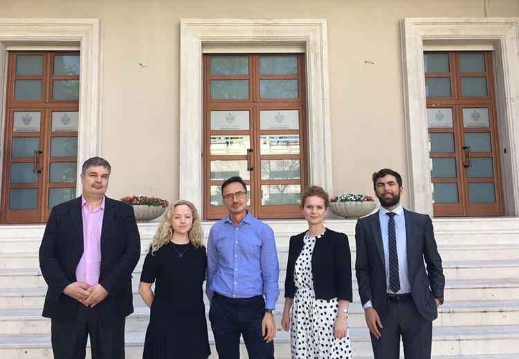 Members of the press freedom mission to Albania, pictured outside the prime minister's office in Tirana, in June. From left, Oliver Vujovic from SEEMO, Sarah Clarke, of Article 19, CPJ Europe Correspondent Attila Mong, Flutura Kusari of ECPMF, and Scott Griffen of IPI. (Flutura Kusari)