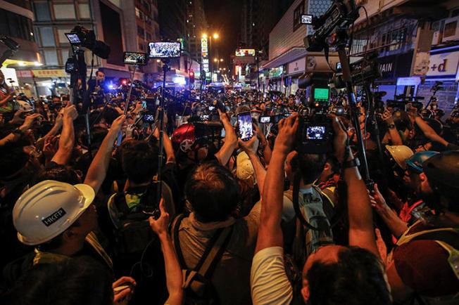 Journalists are seen in Hong Kong on July 7, 2019. The Hong Kong Journalists Association recently released a report showing a deterioration of press freedom in the special administrative region. (AP/Andy Wong)