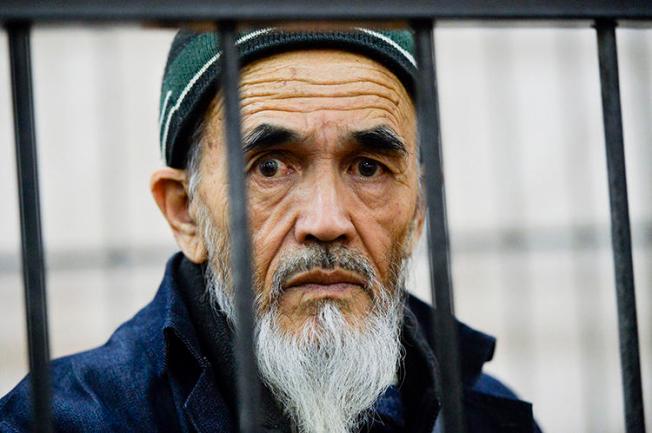 Journalist Azimjon Askarov is seen in a courtroom in Bishkek, Kyrgyzstan, on October 11, 2016. A court today upheld his life sentence in prison. (AP/Vladimir Voronin, file)