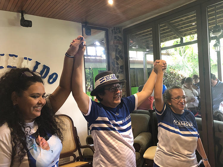 Verónica Chávez, Miguel Mora, and Lucia Pineda, after Mora and Pineda's release from prison June 11, in Managua, Nicaragua. (CPJ)