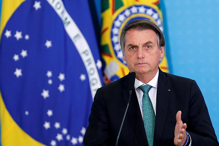 Brazilian President Jair Bolsonaro is seen in Brasilia on July 24, 2019. He recently threatened that journalist Glenn Greenwald may face jail time in Brazil. (Reuters/Adriano Machado)