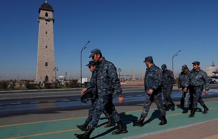Police officers are seen in Magas, Ingushetia, on October 8, 2018. FSB agents in Ingushetia recently detained and allegedly tortured journalist Rashid Maysigov. (Reuters/Maxim Shemetov)