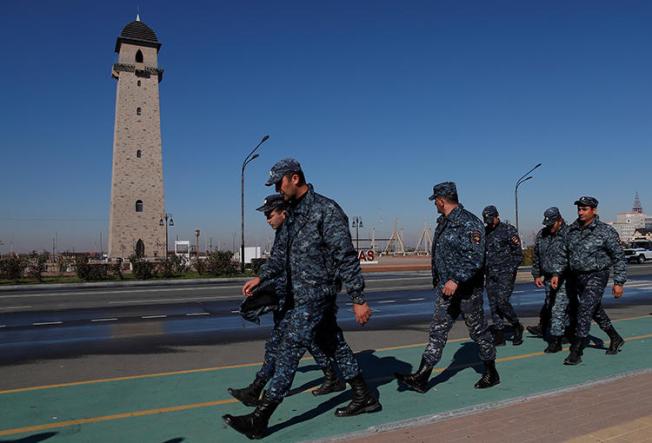 Police officers are seen in Magas, Ingushetia, on October 8, 2018. FSB agents in Ingushetia recently detained and allegedly tortured journalist Rashid Maysigov. (Reuters/Maxim Shemetov)