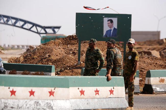 Soldiers are seen in Deraa, Syria, on July 7, 2018. Journalist Alaa Nayef al-Khader al-Khalidi died in a Syrian military prison, his family was recently told. (Reuters/Omar Sanadiki)