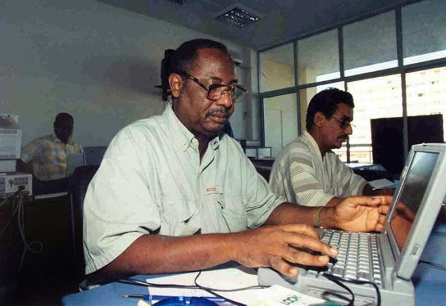 AFP correspondent Deyda Hydara, front, pictured in November 1999. (AFP/Seyllou)