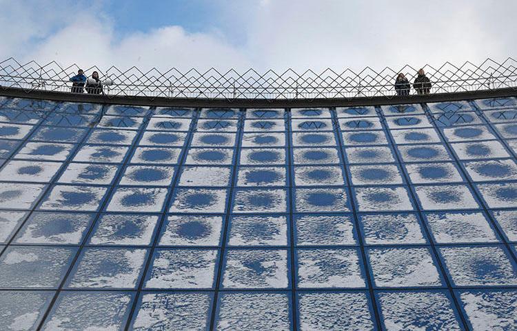 People look across at the city central square from the mall viewing platform covered with snow in Kiev, in January 2019. A court in the city on August 6 ruled against Hromadske TV in a case over the outlet's tweet about a nationalist group. (AP/Efrem Lukatsky)