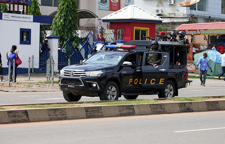 Police are seen in Abuja, Nigeria, on July 23, 2019. Nigerian publisher Agba Jalingo has been detained since August 22 without charge. (Reuters/Afolabi Sotunde)