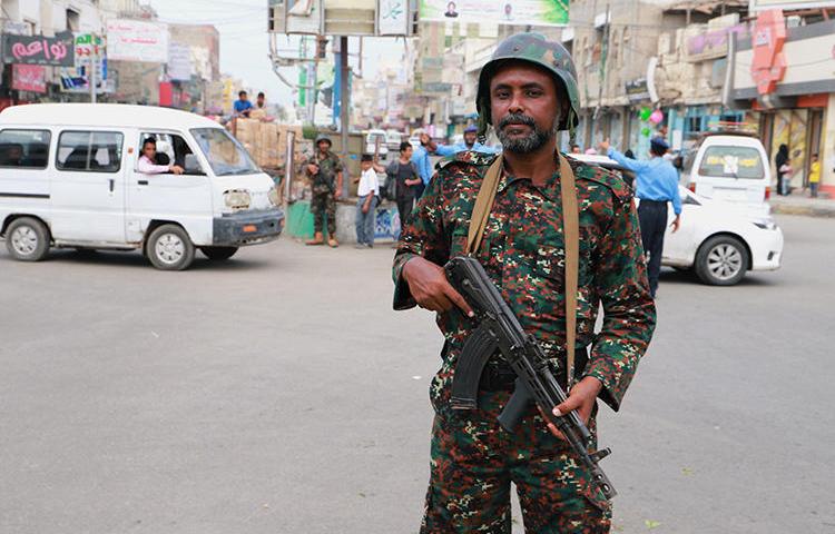 A police officer is seen in Hodeidah, Yemen, on February 13, 2019. Military police recently arrested and released three journalists in Taiz. (Reuters/Abduljabbar Zeyad)
