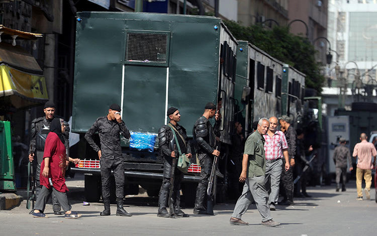 Police officers are seen in Cairo, Egypt, on September 27, 2019. Police recently arrested several journalists amid a crackdown throughout the country. (Reuters/Mohamed Abd El Ghany)