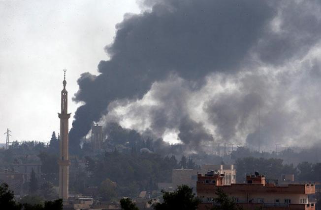 In this photo taken from the Turkish side of the border with Syria, in Akcakale, Sanliurfa province, smoke billows from targets inside Syria during bombardment by Turkish forces on October 10, 2019. Turkey has banned critical reports on the assault. (AP/Lefteris Pitarakis)