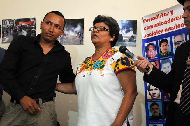 Sandra Maribel Sanchez is seen in Tegucigalpa, Honduras, on August 29, 2012. In September, an attacker held a gun to the journalist's head. (AFP/Orlando Sierra)