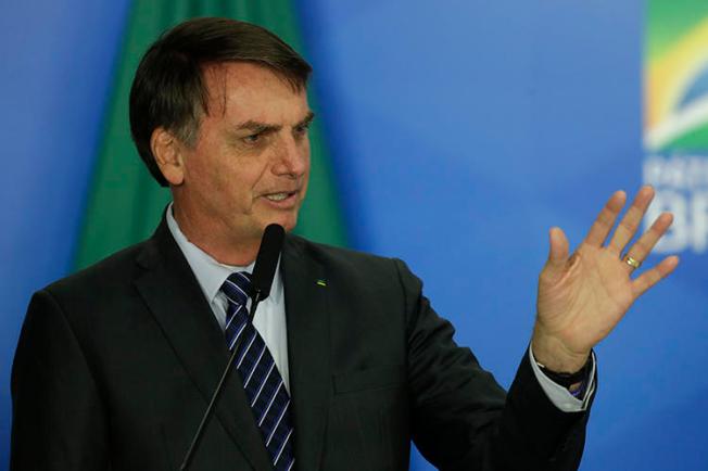 Brazilian President Jair Bolsonaro is seen in Brasilia on October 8, 2019. Bolsonaro recently insulted and threatened the Globo media company. (AP/Eraldo Peres)