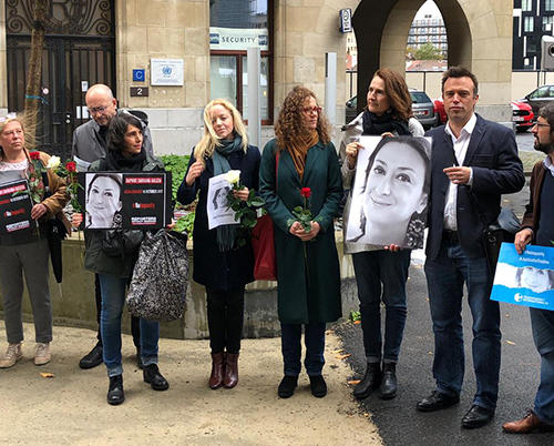 CPJ's EU representative, Tom Gibson, stands with representatives of the European Commission, European Federation of Journalists, Reporters Without Borders, Article 19, European Parliament, and Transparency International at a vigil in Brussels for slain journalist Daphne Caruana Galizia. (Photo courtesy of the office of European Parliament Member Roberta Metsola.)