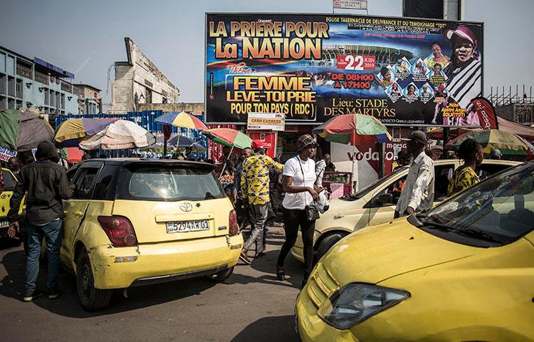 Taxis in Kinshasa in June 2019. Police in the Democratic Republic of Congo capital detained a journalist for five days over a criminal defamation complaint. (AFP/John Wessels)