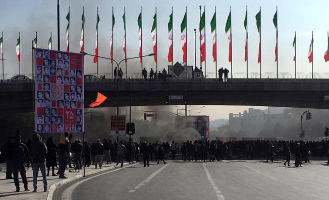 Smoke rises during a protest in Isfahan, Iran, on November 16, 2019. Iranian authorities have cut internet access nationwide amid the protests. (AP Photo)