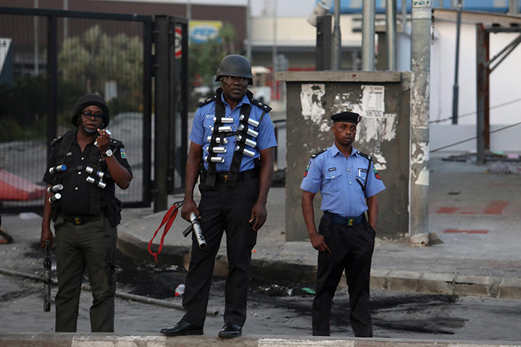 Police officers are seen near Lagos, Nigeria, on September 3, 2019. Journalists in Kogi and Bayelsa states reported being harassed and threatened during recent elections. (Reuters/Temilade Adelaja)