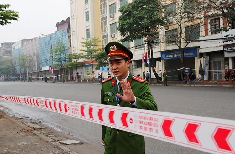 A police officer is seen in Hanoi, Vietnam, on February 26, 2019. Police recently arrested journalist Pham Chi Dung on anti-state charges. (Reuters/Kim Kyung-Hoon)