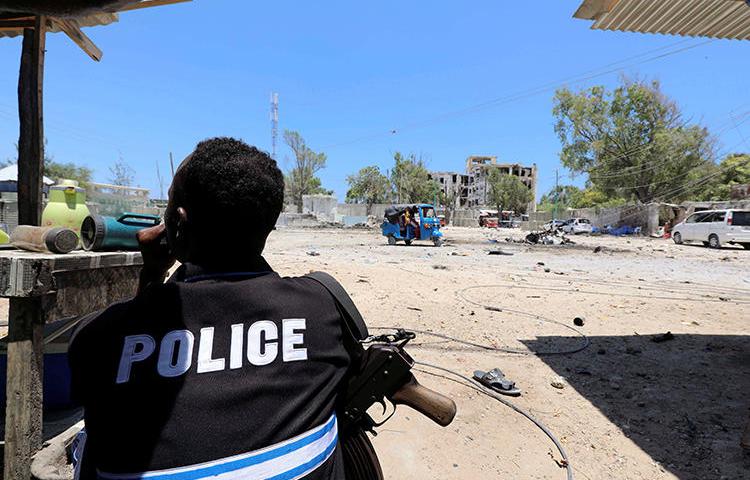 A police officer is seen in Mogadishu, Somalia, on March 23, 2019. Somali authorities recently shut down local broadcaster City FM and briefly detained its staffers. (Reuters/Feisal Omar)