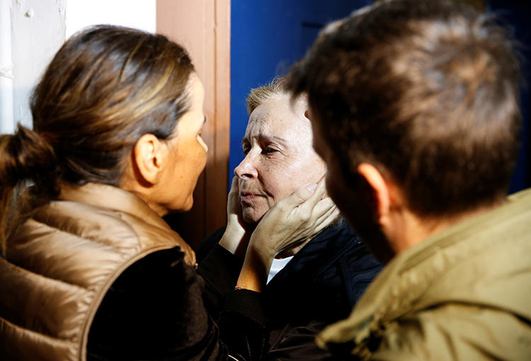 Journalist Nazli Ilicak is embraced after her release from prison in Istanbul in November 2019, after a court ordered her free on time served at a retrial. Two of her colleagues remain in prison on terrorism related charges, among the 47 journalists jailed in Turkey. (Reuters/Huseyin Aldemir)