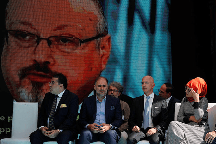 Hatice Cengiz, fiancée of murdered Saudi journalist Jamal Khashoggi, and Jeff Bezos, owner of The Washington Post, attend a ceremony marking the anniversary of Khashoggi's killing on October 2, 2019. (Reuters/Umit Bektas)