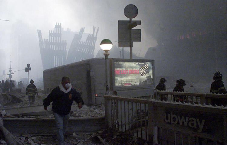 The wreck of the World Trade Center after the 9/11 terror attack in New York. Journalists who developed health issues after reporting from Ground Zero can seek support from several programs. (Reuters/Peter Morgan)