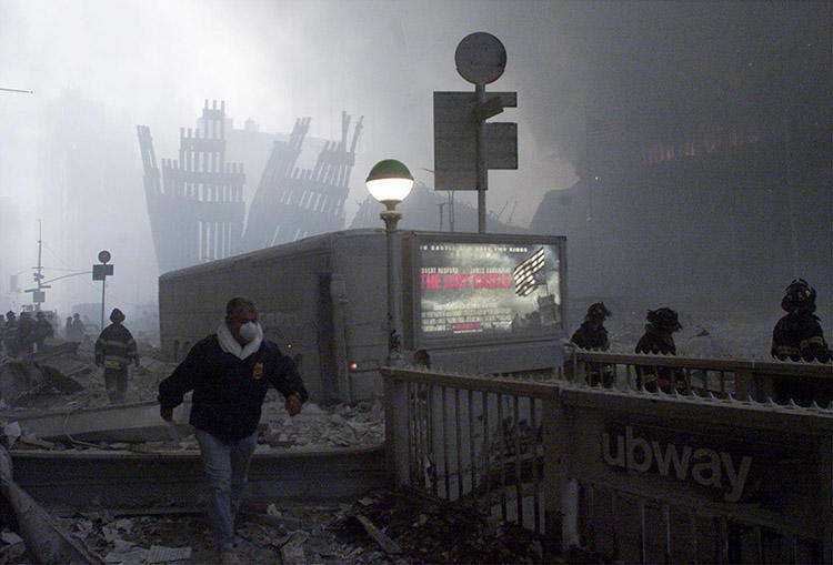 The wreck of the World Trade Center after the 9/11 terror attack in New York. Journalists who developed health issues after reporting from Ground Zero can seek support from several programs. (Reuters/Peter Morgan)