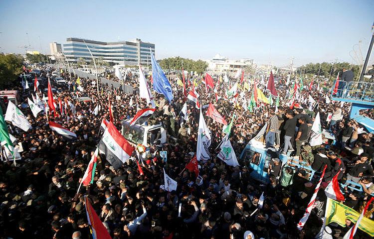 Iraqis gather in Basra, Iraq, during a funeral procession on January 7, 2020, for militia commander Abu Mahdi al-Muhandis, who was killed by a U.S. airstrike at Baghdad airport. (Reuters/Essam al-Sudani)