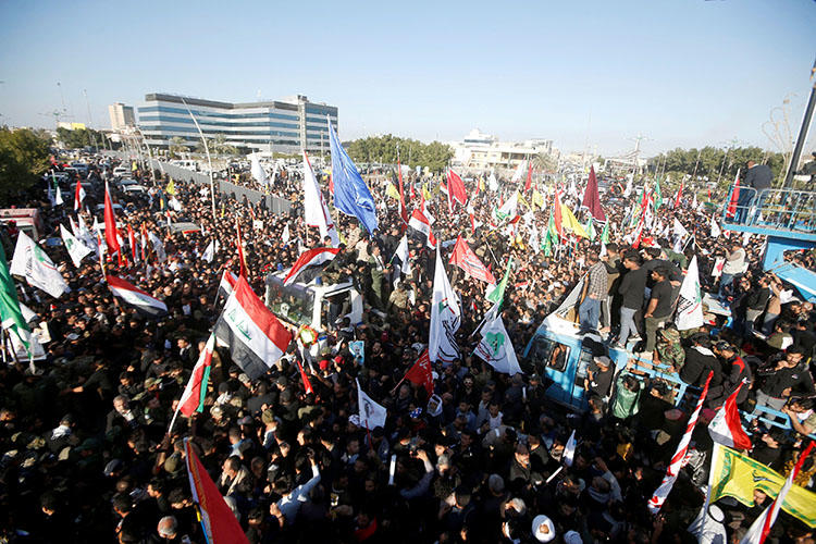 Iraqis gather in Basra, Iraq, during a funeral procession on January 7, 2020, for militia commander Abu Mahdi al-Muhandis, who was killed by a U.S. airstrike at Baghdad airport. (Reuters/Essam al-Sudani)