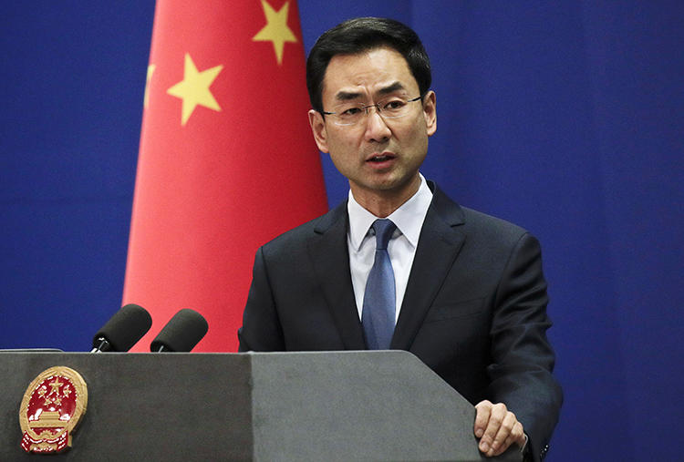 Chinese Foreign Ministry spokesperson Geng Shuang speaks in Beijing on January 29, 2019. Geng announced today that three Wall Street Journal journalists will be expelled from the country. (AP/Andy Wong)