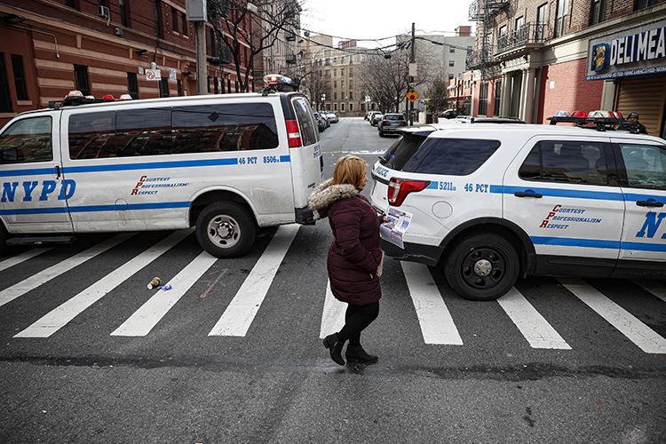 New York City police vehicles are seen on February 9, 2020. The NYPD recently cited anti-terrorism legislation in a subpoena seeking a journalist's data from Twitter. (AP/John Minchillo)